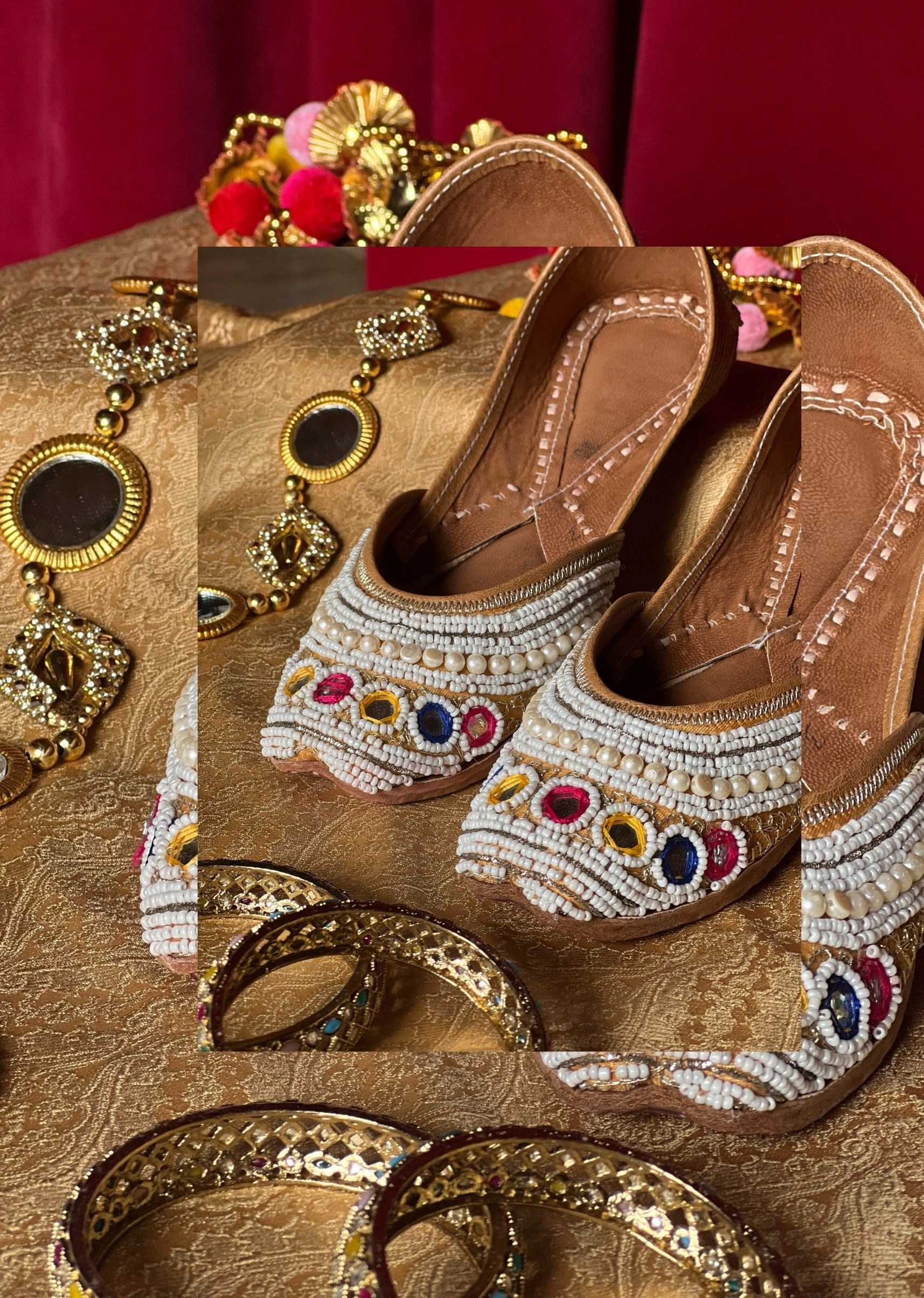 Golden jutti with multi colour work